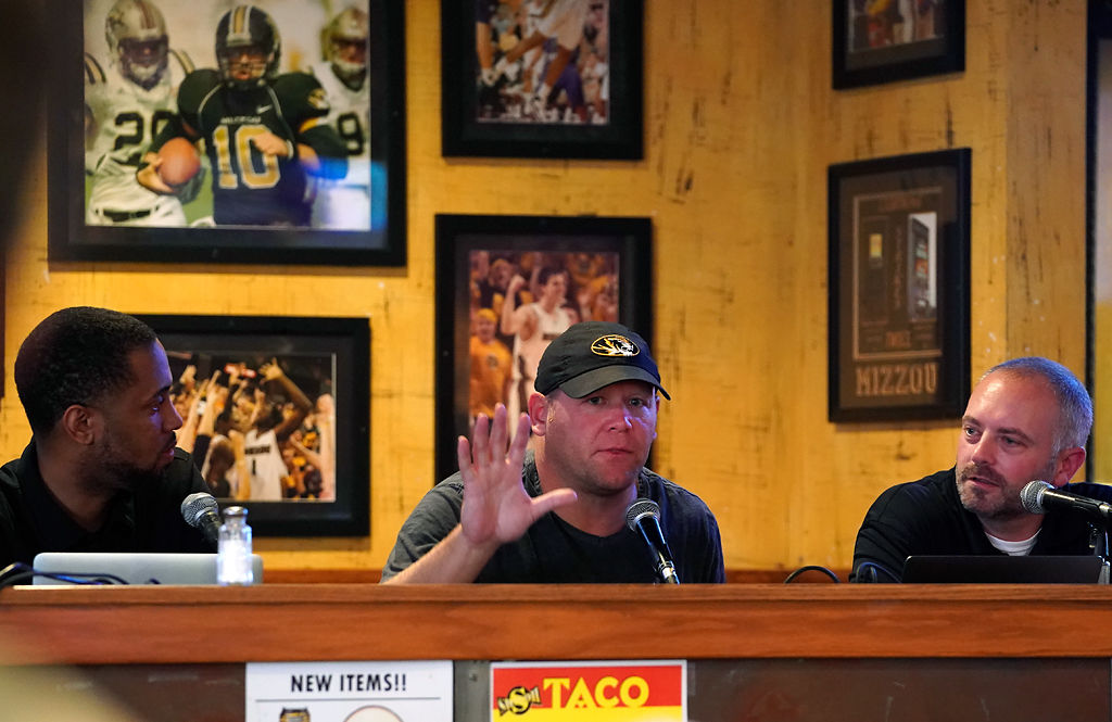 Barry Odom waves to the audience